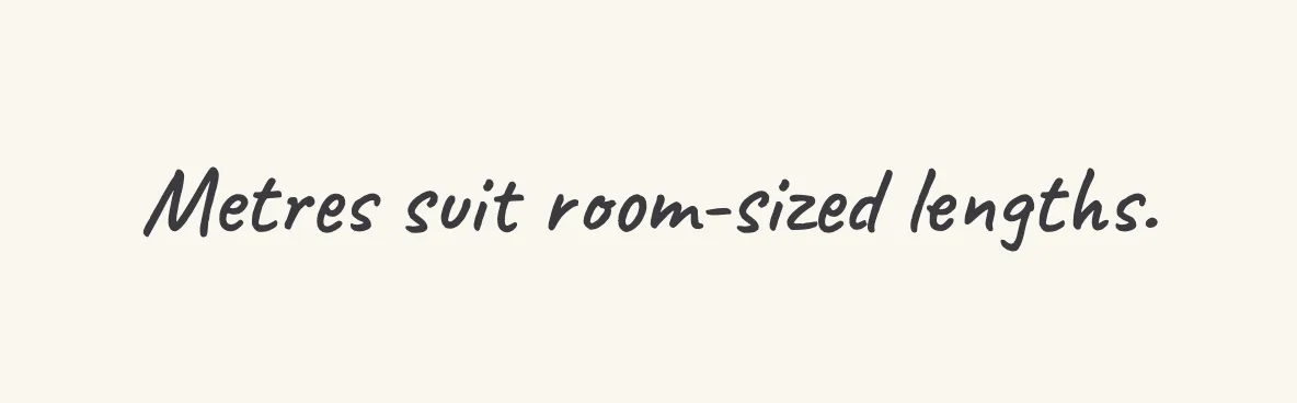One step of the worked solution to measure length in metres, drawn in pencil.